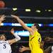 Michigan freshman Mitch McGary looks for a basket over Kansas senior Jeff Withey March 29, 2013. Melanie Maxwell I AnnArbor.com
